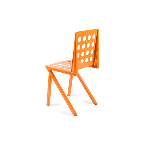 Silla Pliego V2 ligera y minimalista, perfecta para cualquier espacio contemporáneo.